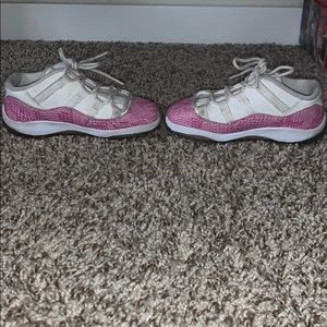 Low top pink Jordan shoes